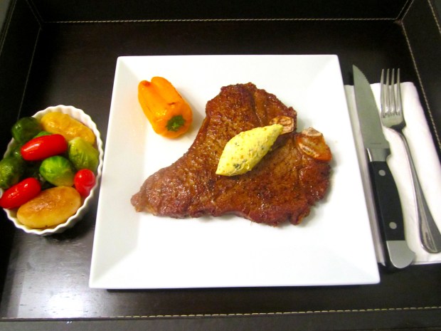 T Bone Steak With Garlic & Scallion Butter, Potatoes, Brussel Spouts and Roma Potatoes 