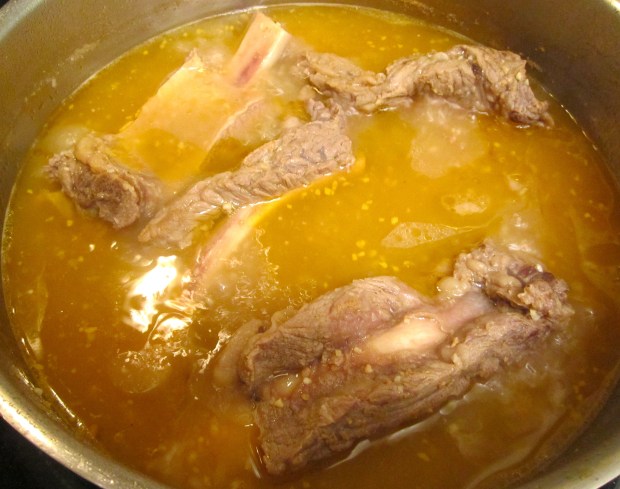 Simmer Ribs, Garlic, Kosher Salt And Freshly Ground Black Pepper Until Ribs Are Almost Tender