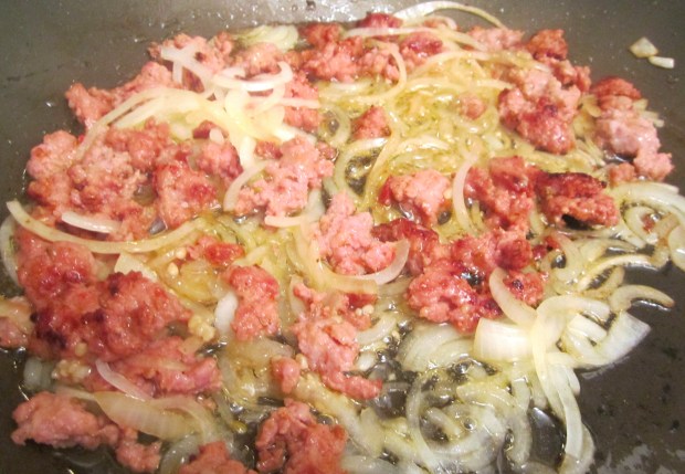 Add garlic paste and onion julienne