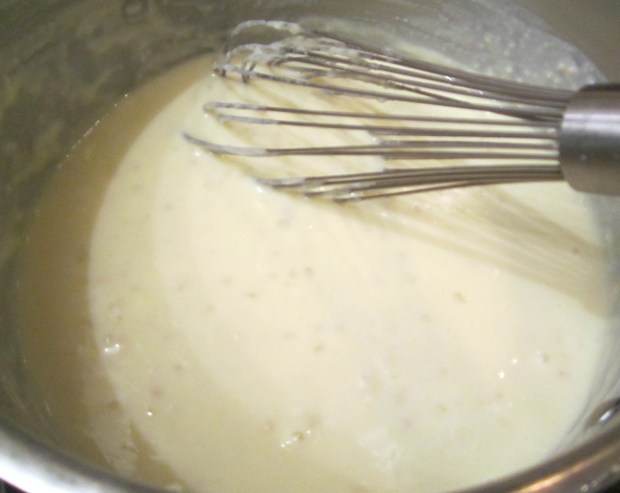 add half milk and half heavy cream, season with salt, pepper and nutmeg. Simmer for five minutes. sauce must be VERY thick, chopped spinach contains lot's of water