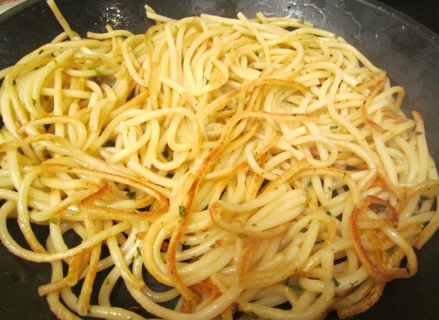 saute bucatini until slightly crisp, season with kosher salt and freshly ground black pepper