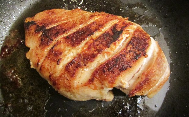 score the top of a  skinless chicken breast crosswise, season with cayenne pepper, kosher salt, granulated garlic and garam masala, saute in butter until just done, remove to catting board, let rest for 5 minutes