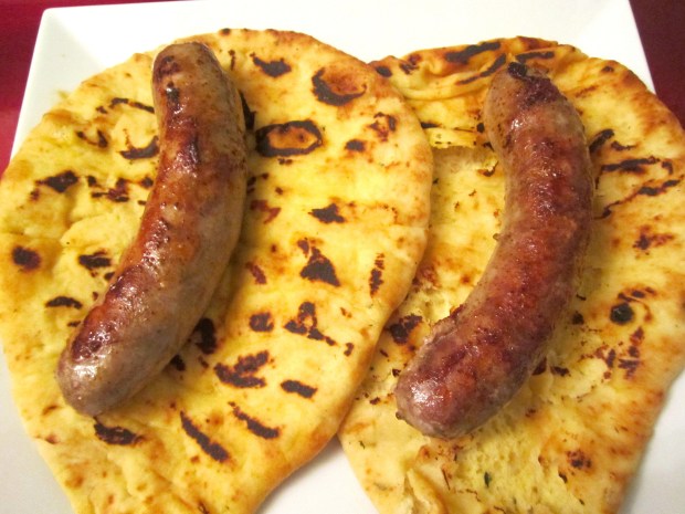 top naan with bratwurst