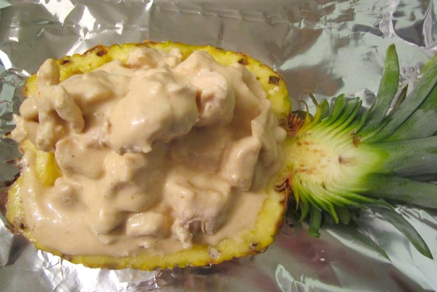 fill hollowed half pineapple with salpicon