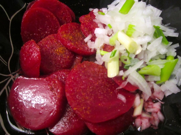 meanwhile, make a salad of red beets, raspberry vinagrette, diced onions and sliced scallions