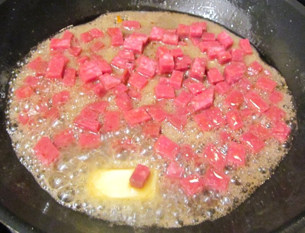 saute diced chorizo in plenty of butter