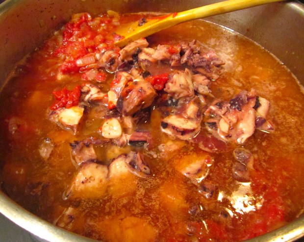 deglaze with red wine, add octopus with it's canned oil, kosher salt and cayenne pepper, simmer fr three minutes, check/adjust seasoning