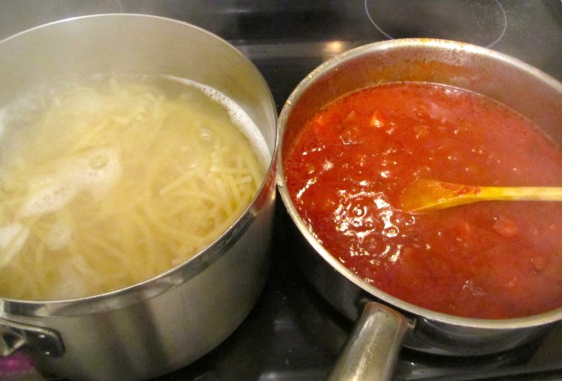 meanwhile, cook bucatini al dente, strain, mix with olive oil