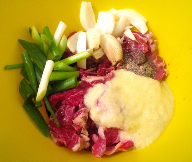 season with kosher salt, black pepper, brown sugar, soy sauce, sesame oil, blended pinepple mix, mix well, marinade for 30 minutes (for a tough cut of beef such as top round, marinade up to 8 hours)