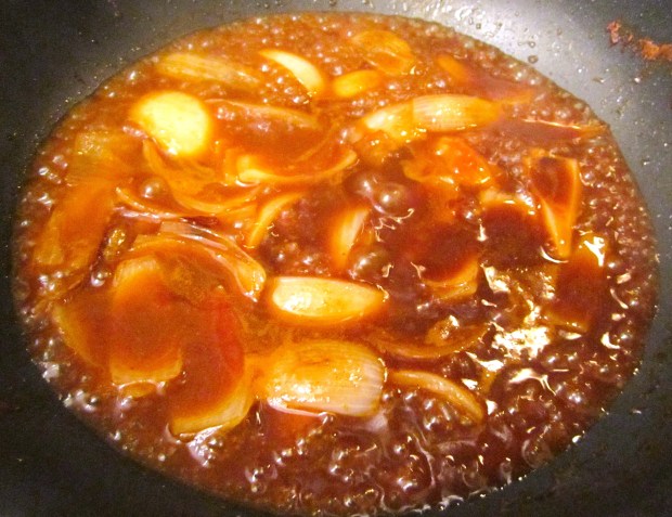 add soy sauce, oyster sauce, chicken stock, sesame oil and sugar, simmer until slightly thickened