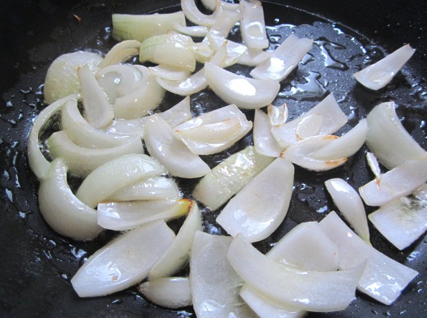 saute onions and garlic paste in peanut oil