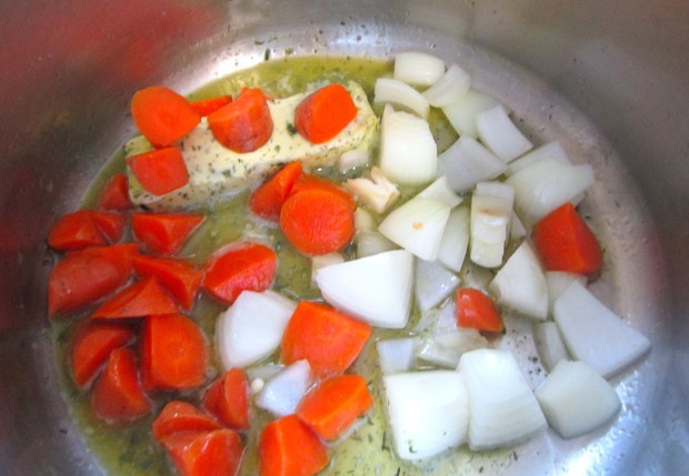 saute carrots and onions in a generous amount of herb / garlic butter and olive oil until starting to caramelize