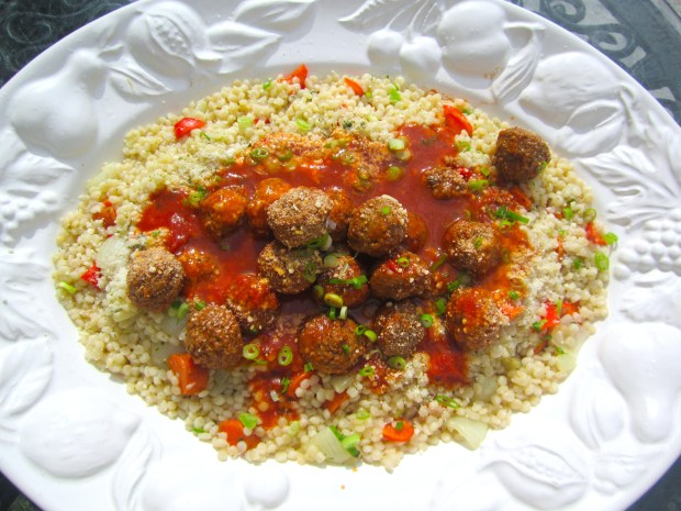 add lamb meatballs and harissa / tomato sauce