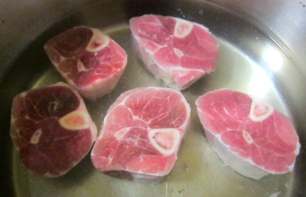 simmer pork shank's in stock seasoned with star anis, cinnamon, garlic paste, black pepper, salt and grated ginger until tender but NOT falling apart