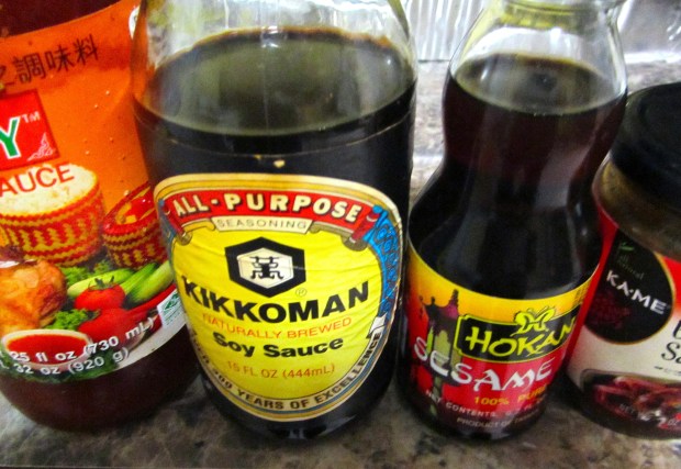 meanwhile, make a basting sauce by whisking together fermented bean sauce, sweet chili sauce, soy sauce and sesame oil