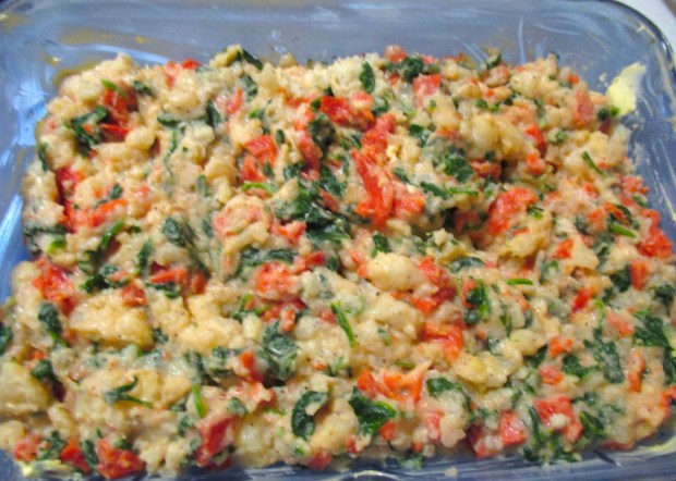 put mixture in buttered baking dish