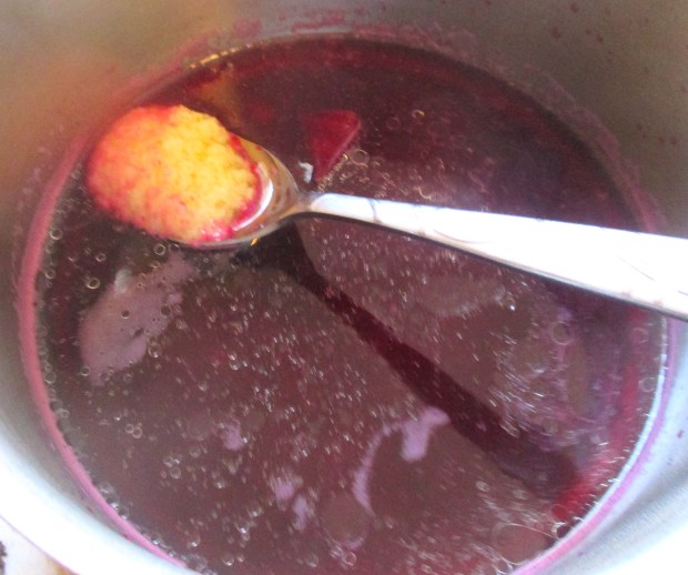 return beet stock to a simmer, season with garlic paste and cayenne pepper