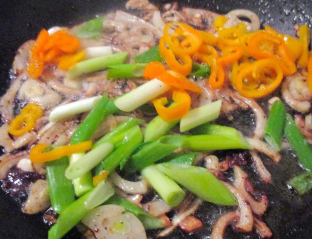 saute onion, scallion and chilies in garlic oil, season with kosher salt and fresh ground black pepper