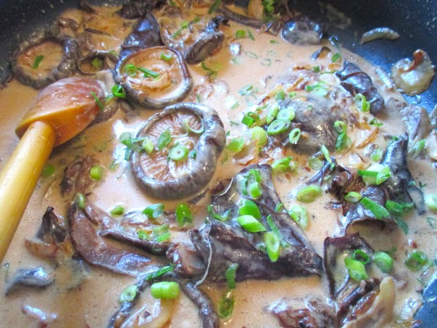 simmer until cream has reduce to desired texture, add scallions, check / adjust seasoning