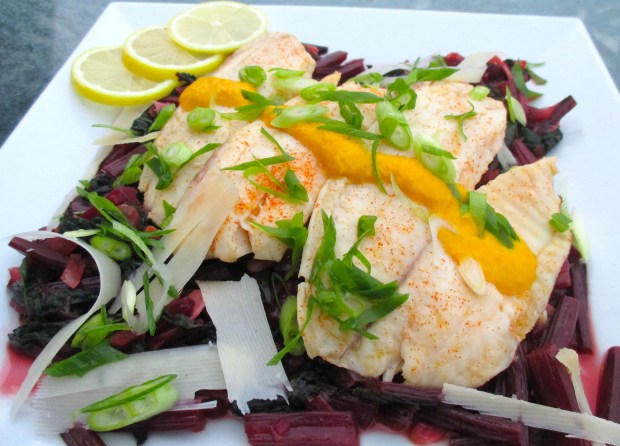 Sauteed Red Beet Leaves With Steamed Swai Filet, Aji Amarillo Sauce, Parmesan Shavings & Scallions