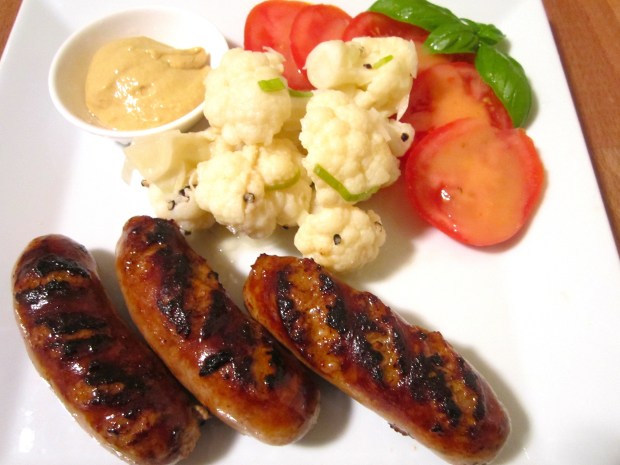 spicy italian sausages with pickled cauliflower and tomato in honey/mustard vinaigrette