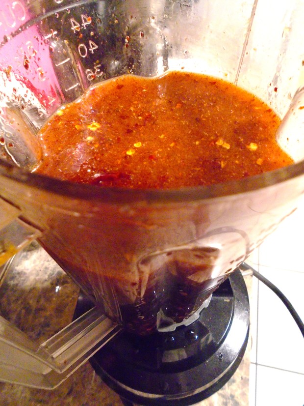 put oil with chiles in blender, blend until chiles are finely ground