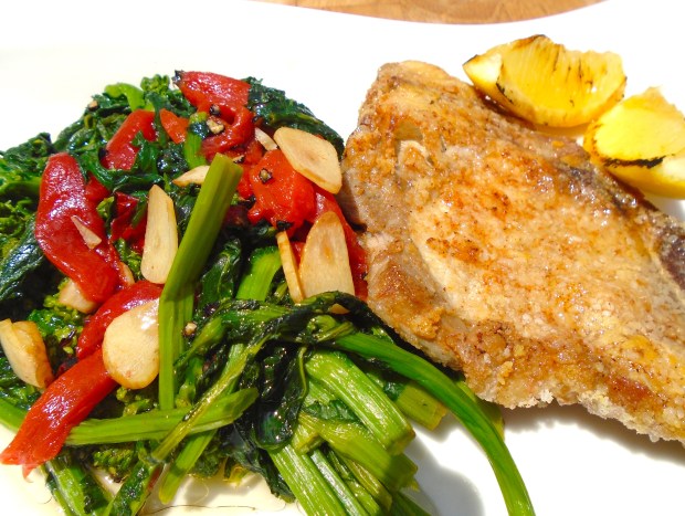 Cheese-Coated Pork Chop With Garlic-Broccolini And Charred Peppers